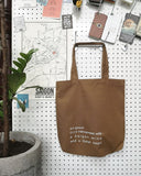 Túi tote in chữ Vietnamese with a Saigon mind and a Vungtau heart