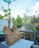 Túi tote in chữ Vietnamese with a Saigon mind and a Hanoi heart