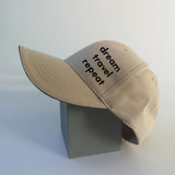 Nón lưỡi trai in chữ dream, travel, repeart (form đứng)