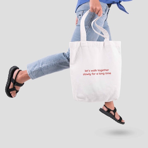 Túi tote vải in chữ Let's walk together slowly for a long time