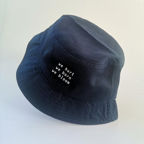 Nón bucket in chữ We hurt we burn we bloom - (nhiều màu)