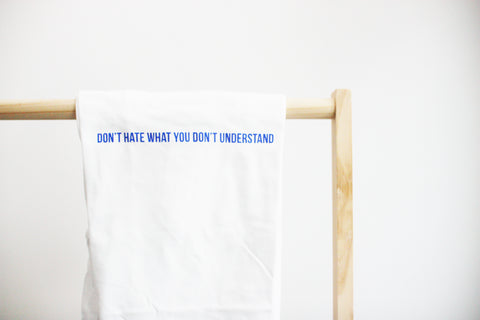 Do not hate what you do not understand - quote tee.