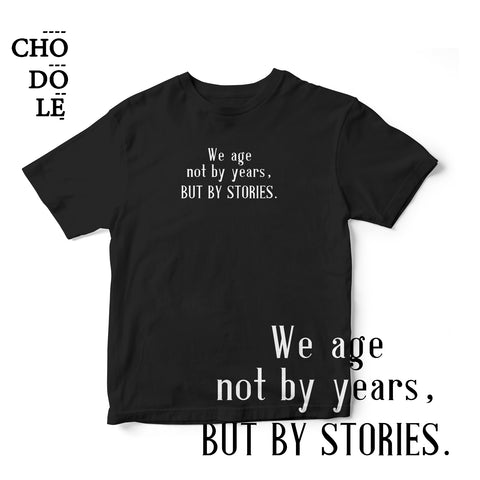 Áo thun cotton 100% in chữ We age not by years, BUT BY STORIES. (nhiều màu)